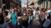 Manifestantes gritan consignas antigubernamentales durante la protesta del 11 de julio en La Habana. (REUTERS/Alexandre Meneghini)